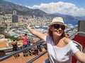 Monaco, France Ã¢â¬â July 24, 2017: Tourist girl having fun on the double-decker bus (tour open topped bus) in the Monaco.